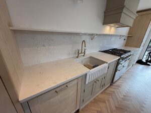 Carrara quartz worktops with shelf